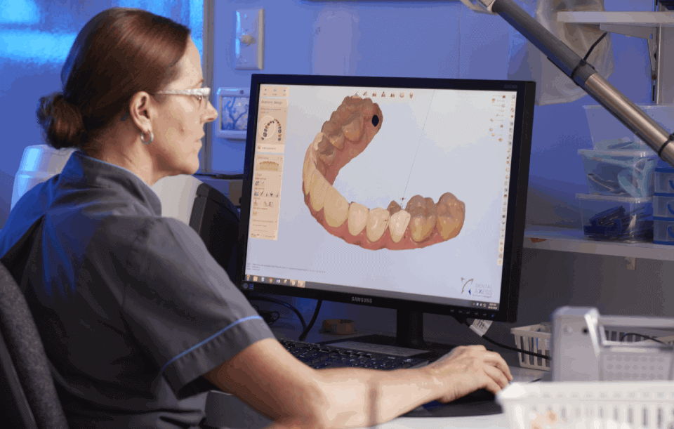 dental technician designing dental crowns on 3shape lab manager